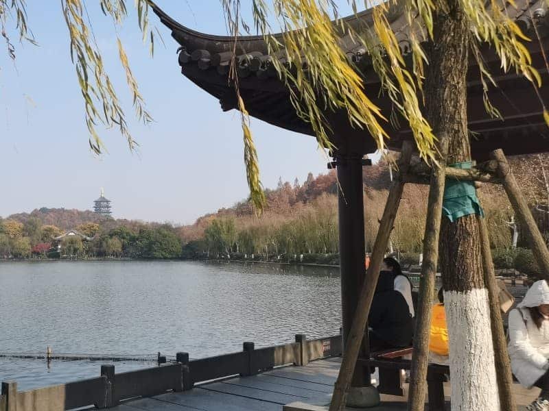 Hangzhou day trip from Shanghai classic West Lake view with causeway and willow trees