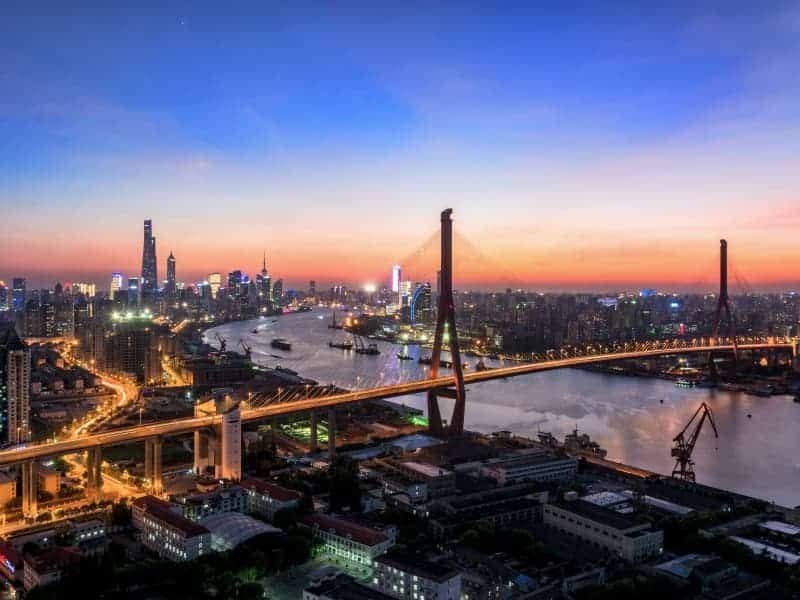 Shanghai layover tour Bund skyline viewpoint at golden hour between flights