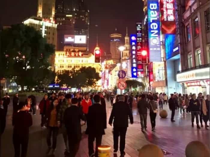 Best Time to Visit Shanghai: Weather, Crowds, and Festivals 3 best time to visit Shanghai summer heat and humidity near Nanjing Road at night