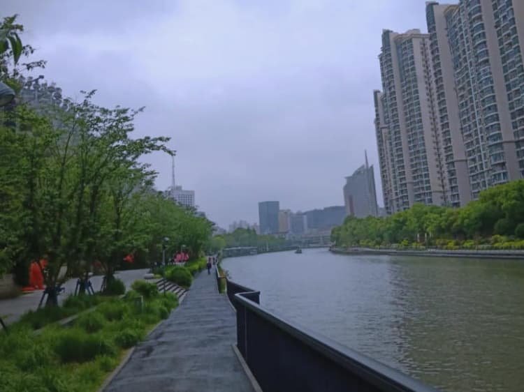 Best Time to Visit Shanghai: Weather, Crowds, and Festivals 4 best time to visit Shanghai - winter wet-cold day along Suzhou Creek riverside paths